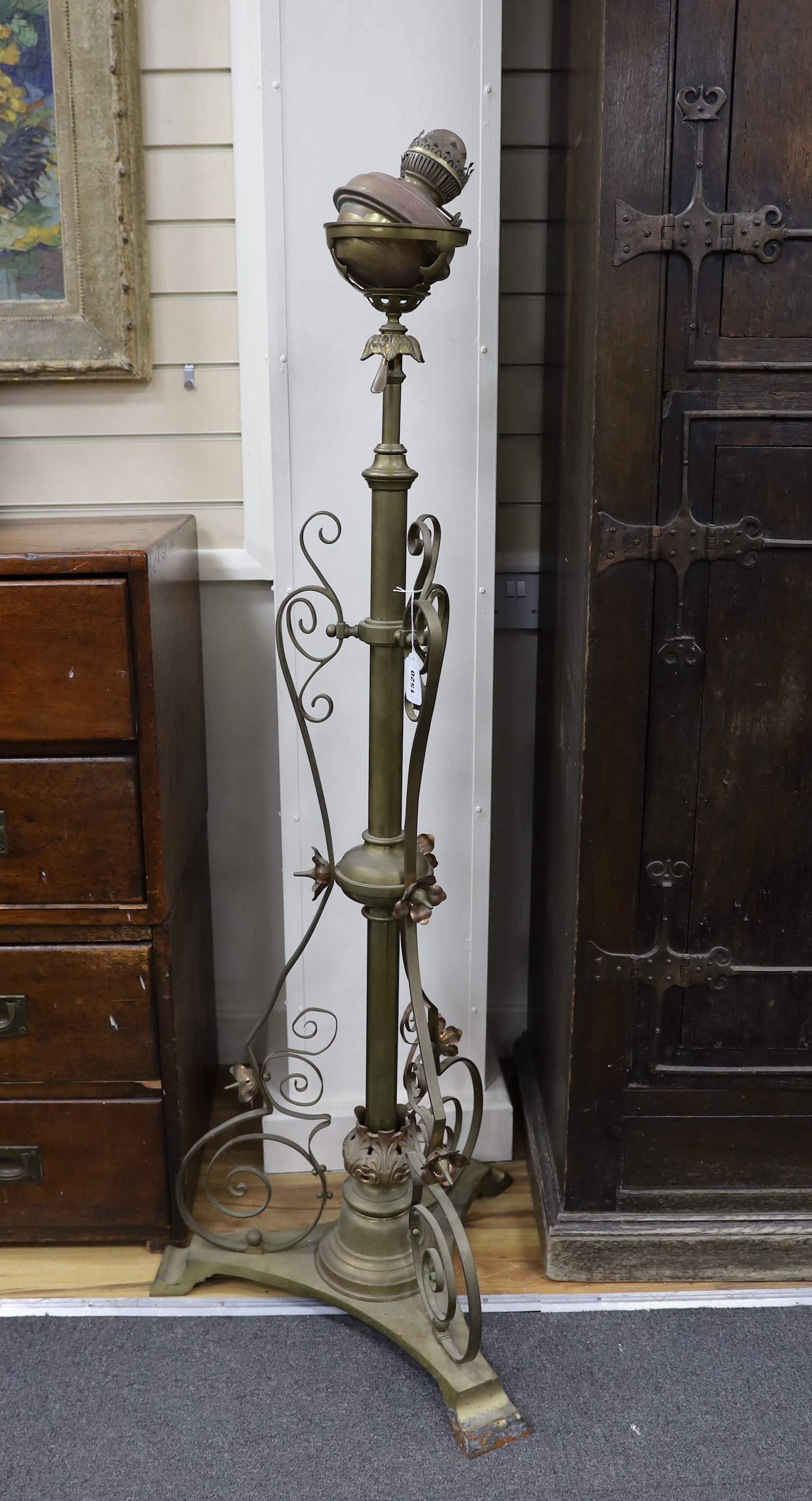An early 20th century brass and copper ‘Benson’ style floor lamp, approximately 140cm high